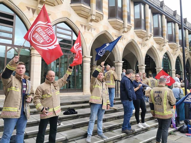 Firefighters protesting outside The Guildhall in Northampton earlier this year.