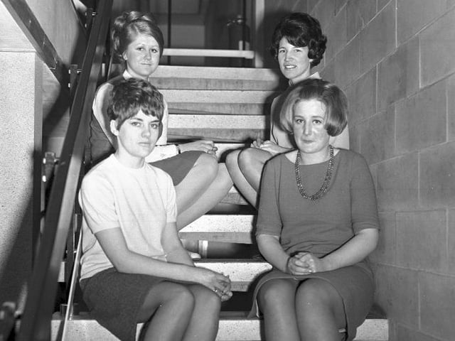 The women on the stairs were photographed at J A Perkins in Kings Heath, Northampton, in 1968 or 1969. Readers believed it was part of a Chronicle & Echo competition for "office girls"!