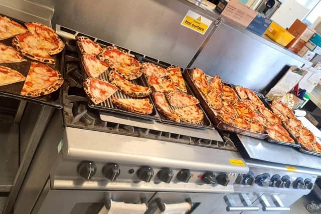 Pizza At 75 has donated a total of 70 large pizzas to The Hope Centre in six months.