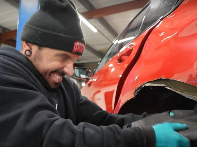 Mat works on the massive repair job on the wrecked BMW M3