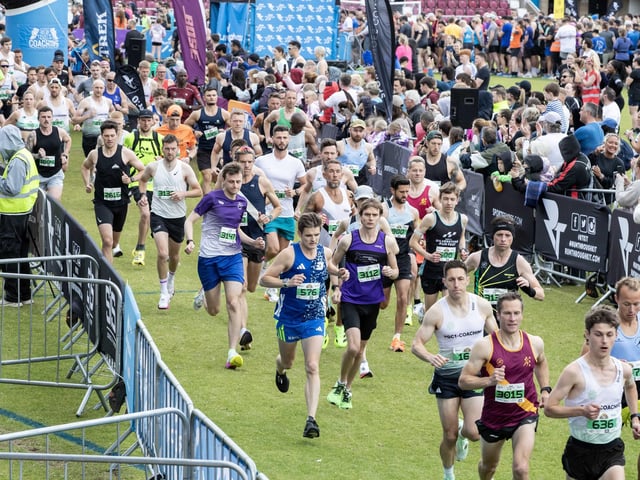 Hundreds of runners braved showers and wind to take on the race on Sunday (May 25), which started and finished at Sixfields stadium.