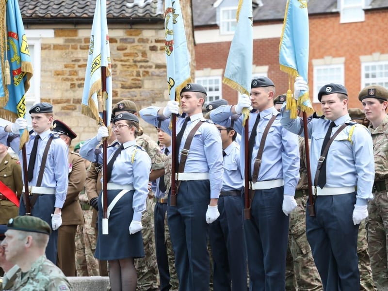 Kettering town centre: crowds line town centre to welcome The Royal Anglian Regiment for Armed Forces Day parade /National World