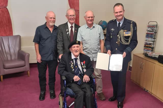 Lieutenant Colonel Sander van Hees, Les Hammond and his son's Geoff, Tim and Paul