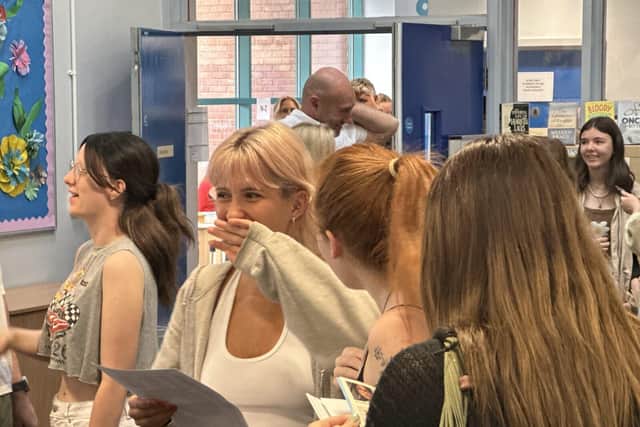 Smiles and more smiles as students celebrate their achievements