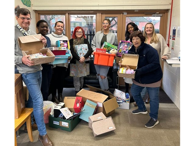 Corby social workers receive gifts from Mother Christmas