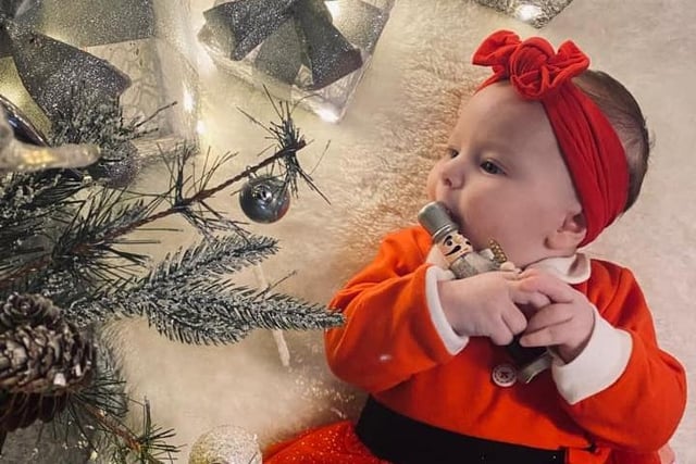 A festive outfit for Ryla Isabelle's first Christmas.