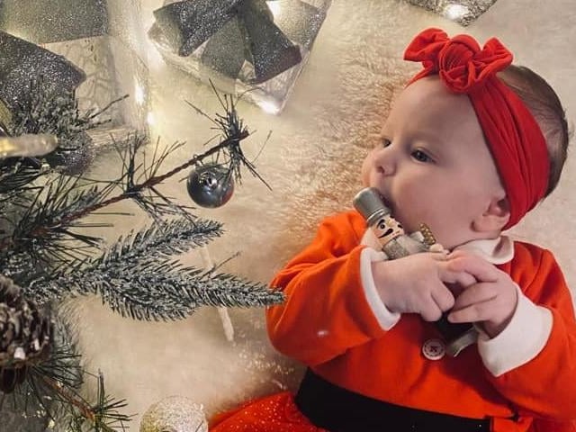A festive outfit for Ryla Isabelle's first Christmas.