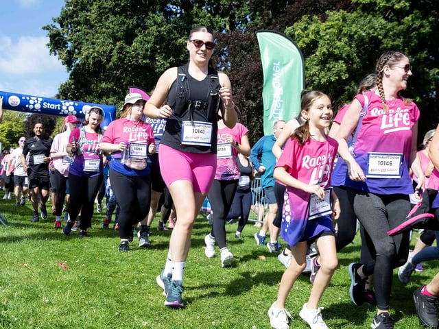 Walkers, runners and joggers completed two laps of Abington Park for the 10k Race for Life on Sunday (July 14).