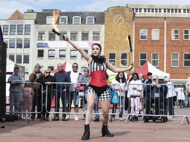 Hundreds enjoyed music, circus acts, and memories from the decade during a sixties celebration event in Northampton's Market Square on Saturday (September 24).