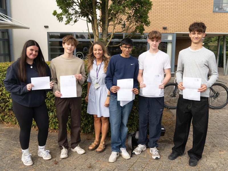 Mrs Freezer, Faculty Leader of Business celebrates with CCS students.