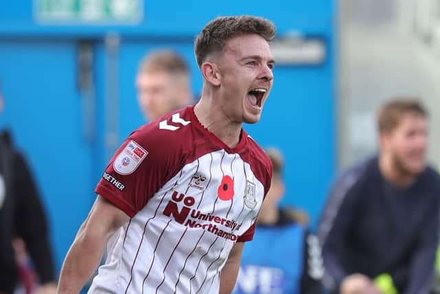 Sam Hoskins shows his delight after netting his late equaliser against Newport County on Saturday (Picture: Pete Norton)