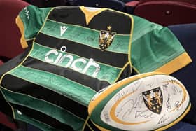 Saints ball and replica signed shirt courtesy of Carlsberg - one of the many auction lots