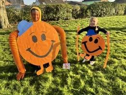 George, aged six, and Maddie, aged three, as Mr Tickle.