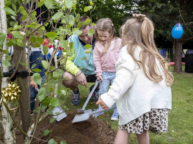 Children, parents and staff enjoyed an afternoon tea as a tree was planted to mark the Queen's 70-year reign.