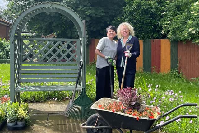 Dawn, volunteer and Muriel Centre Manager getting stuck in.
