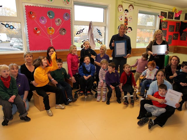 2008: Staff and children from Fairfields School with three awards they have received.