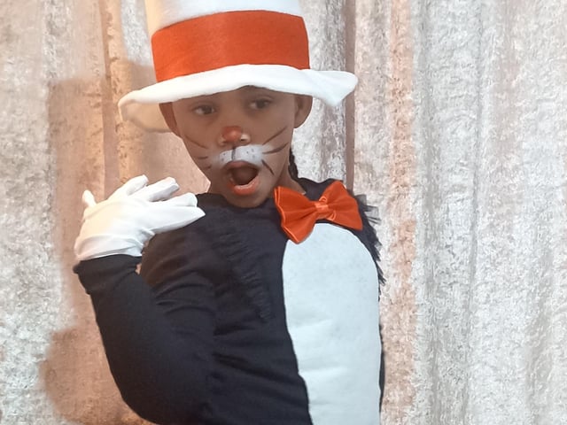 Amara, aged five, as Cat in the Hat.