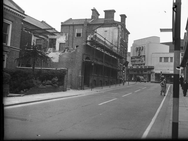 York Road demolition. ABC cinema is showing The Cracksman starring Charlie Drake and Nyree Dawn Porter