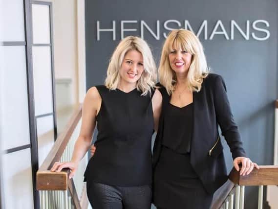 Looking back at Hensmans through the years after the owners announced the closure of the salon. 
Pictured in 2021: Julie Hensman (right) and her daughter - and salon then manager - Gemma Hensman.