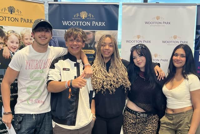 Smiles all round as students at Wootton Park School celebrate their success