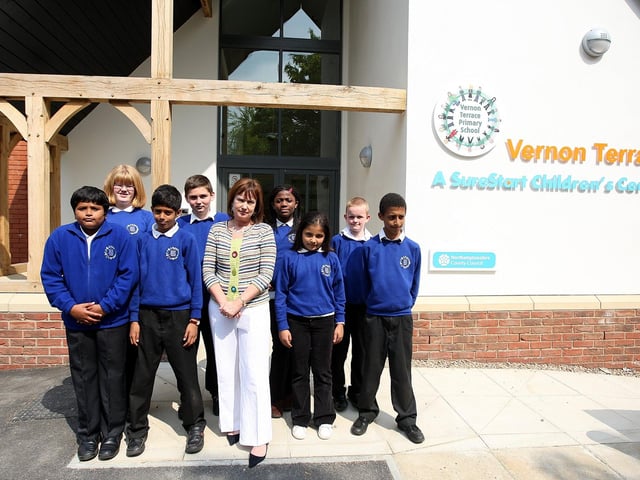 Vernon Terrace Primary School pupils and head Jackie Lapsa outside the new children's centre building.