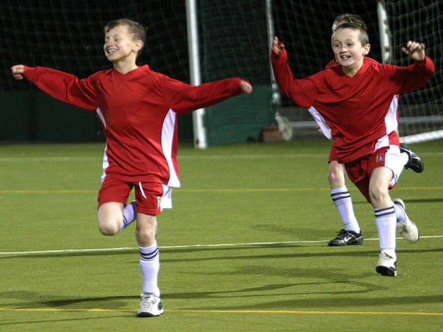 A football tournament at Unity College, organised by Northampton School Sports Partnership. Football action from Vernon Terrace Primary School (black and white) against Chiltern Primary School (red).
