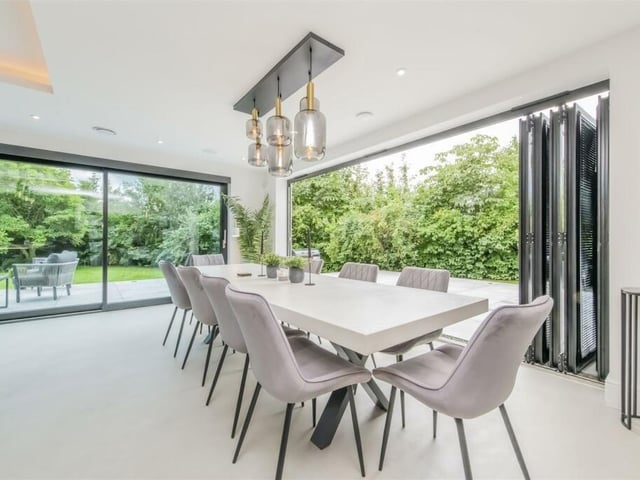 The kitchen diner has wonderful views of the outside garden, with sliding doors offering easy access