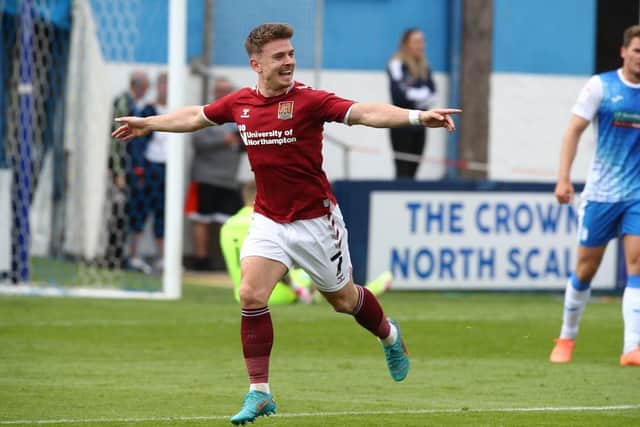 Sam Hoskins celebrates his second goal at Barrow (Picture: Pete Norton)
