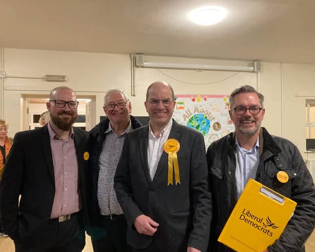 Carl Squires (centre) won the East Hunsbury and Shelfleys by-election.