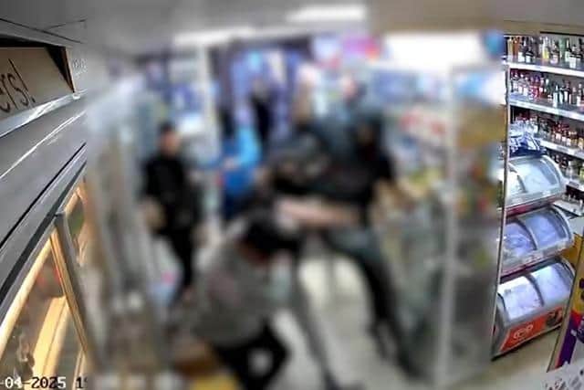 Five teens have been arrested after a Northampton town centre shop was raided by balaclava-clad teens