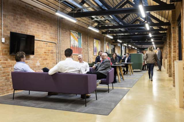 Creatives using the Vulcan Works space.