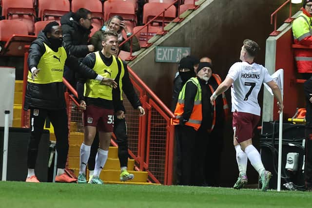 Sam Hoskins celebrates his goal at Charlton with substitutes Monthé and Max Dyche (Picture: Pete Norton/Getty Images)