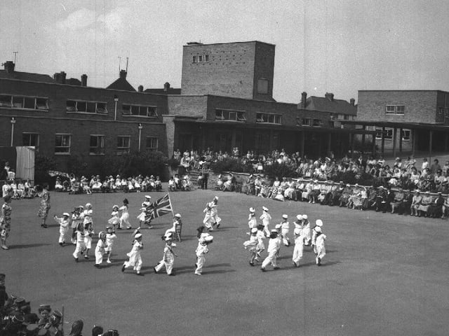 May Day celebrations at Gladstone School, Northampton, children in sailor suits dancing