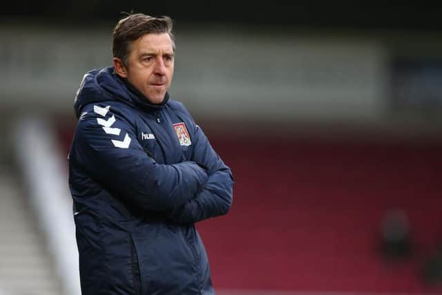 Jon Brady pictured during his first game in charge of the Cobblers, a 2-0 league one defeat to Burton Albion in February, 2021 (Picture: Pete Norton/Getty Images)
