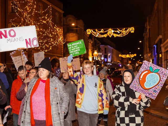 Activists joined the march on Friday November 28 to stand against violence towards women and girls.