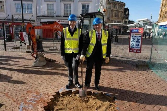 Conservative councillor Daniel Lister (left), who is in charge of the project at WNC, and council leader Jonathan Nunn (right) put the first spade in the Market Square ground on February 6.