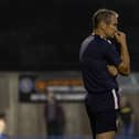 Brackley Town boss Kevin Wilkin watches on during his team's 2-1 defeat at King's Lynn Town. Picture by Glenn Alcock