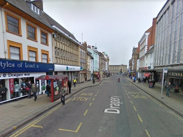 Drapery. The former Style of London sports and designer wear shop (left), and the iconic former Debenhams store (right) was demolished in 2022 to make way for 200 student flats.