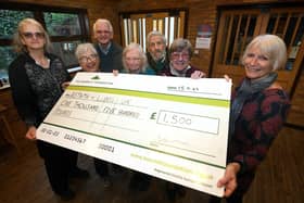 BN - UK012 - Members of Asthma + Lung UK at a local meeting, receiving their cheque from Barratt Hom