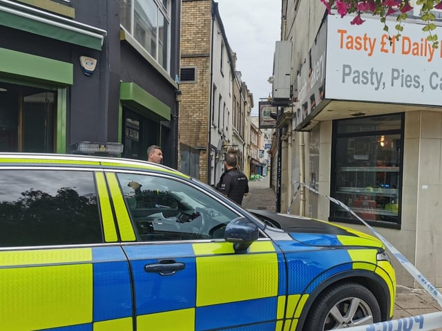 The scene in Northampton town centre today (Tuesday) as police and bomb squad units deal with "suspicious object" found in doorway near Market Square