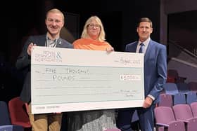 Cheque presented by Mark Conway (far right) to the theatre's Chris Smith and Jo Gordon