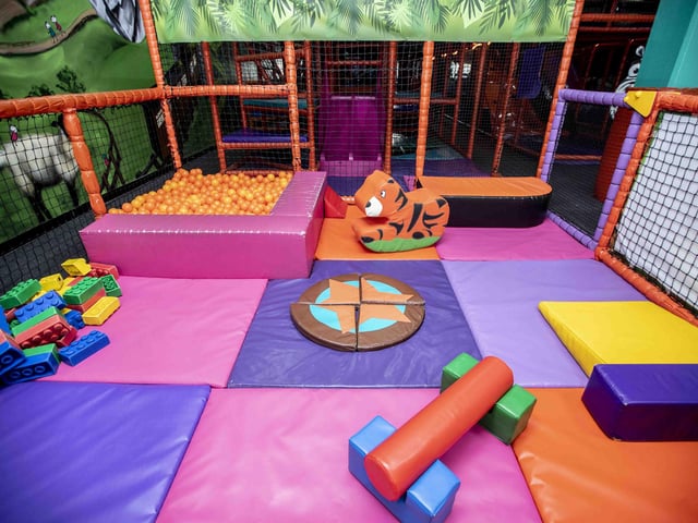 There is a new sensory room, car wash role play zone, two large ball pits with ball showers, and a sports court with astroturf on the top level.
