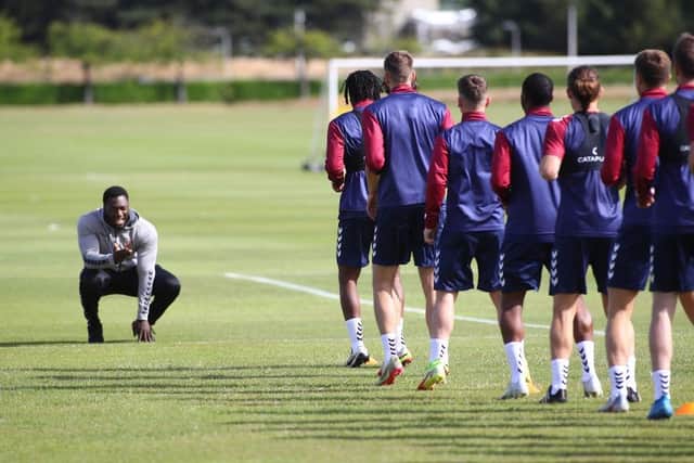 Strength and conditioning coach Ashlee Adebayo puts the players through their paces