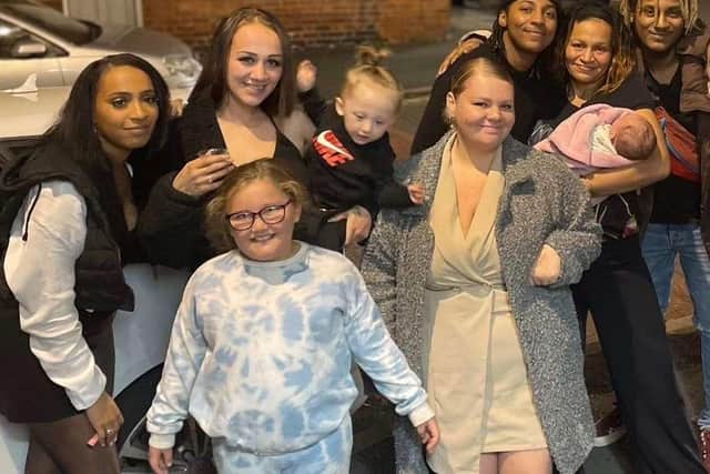 Angeline Bryan, far left, with some of her 14 children