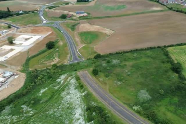 The unjoined southern section of the major relief road in Northampton, fenced off and uncomplete since 2009, is set to connect to the A4500 once construction is completed. Photo: Clare Malings