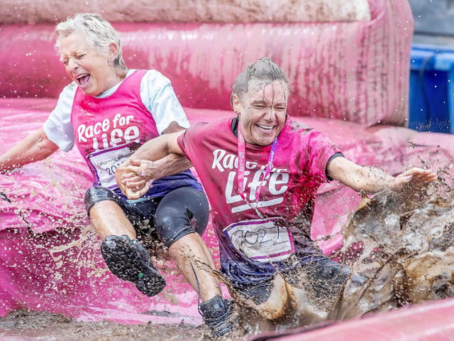 All smiles as participants tackled obstacles during Race for Life's Pretty Muddy on Saturday July 13, 2024 in Abington Park.