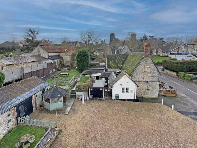 According to the sales advert, the pub is charming and family-friendly with lounge space for 60+ covers, coffee shop area, commercial kitchen, and generous outdoor seating. Includes two-bed manager's accommodation, car park, beer garden, and outbuildings. New seven-year lease available at £24,000 + VAT. Price on request.