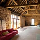 This manor with traditional barn buildings could be yours for a guide price of £1.7 million.