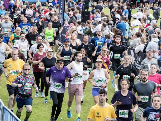 Hundreds of runners braved showers and wind to take on the race on Sunday (May 25), which started and finished at Sixfields stadium.