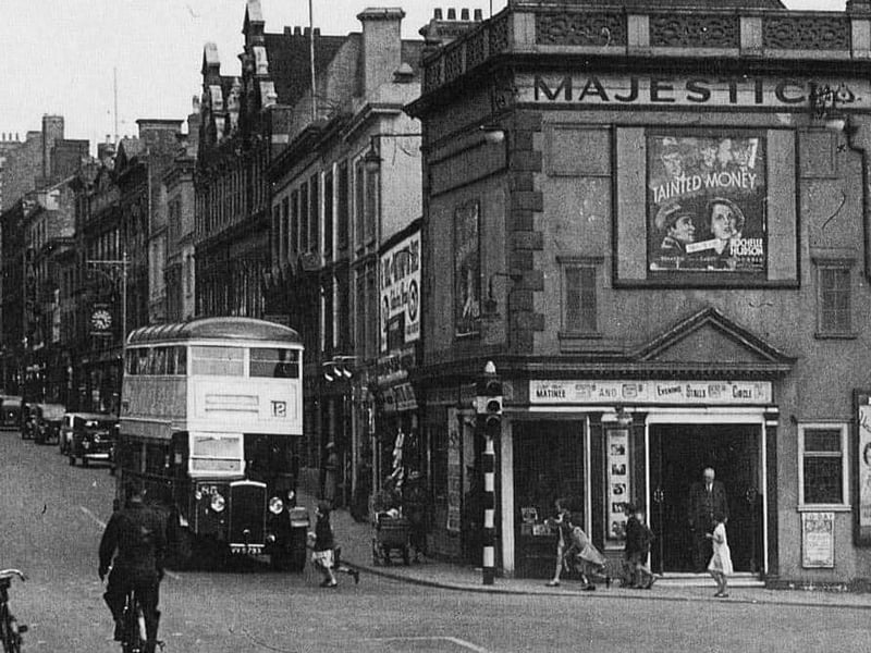 A retro bus travelling down Gold Street.
